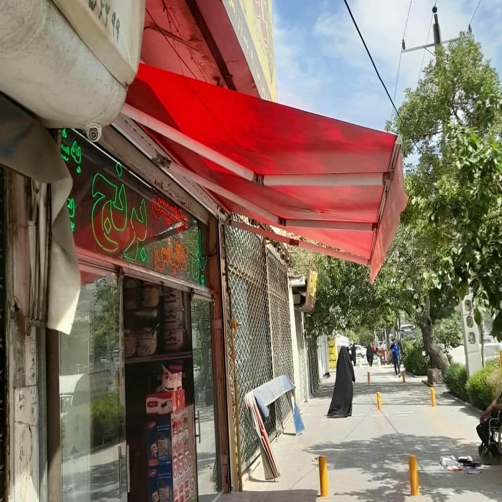 قیمت سایبان برقی اتوماتیک پارچه ضدآب در همدان