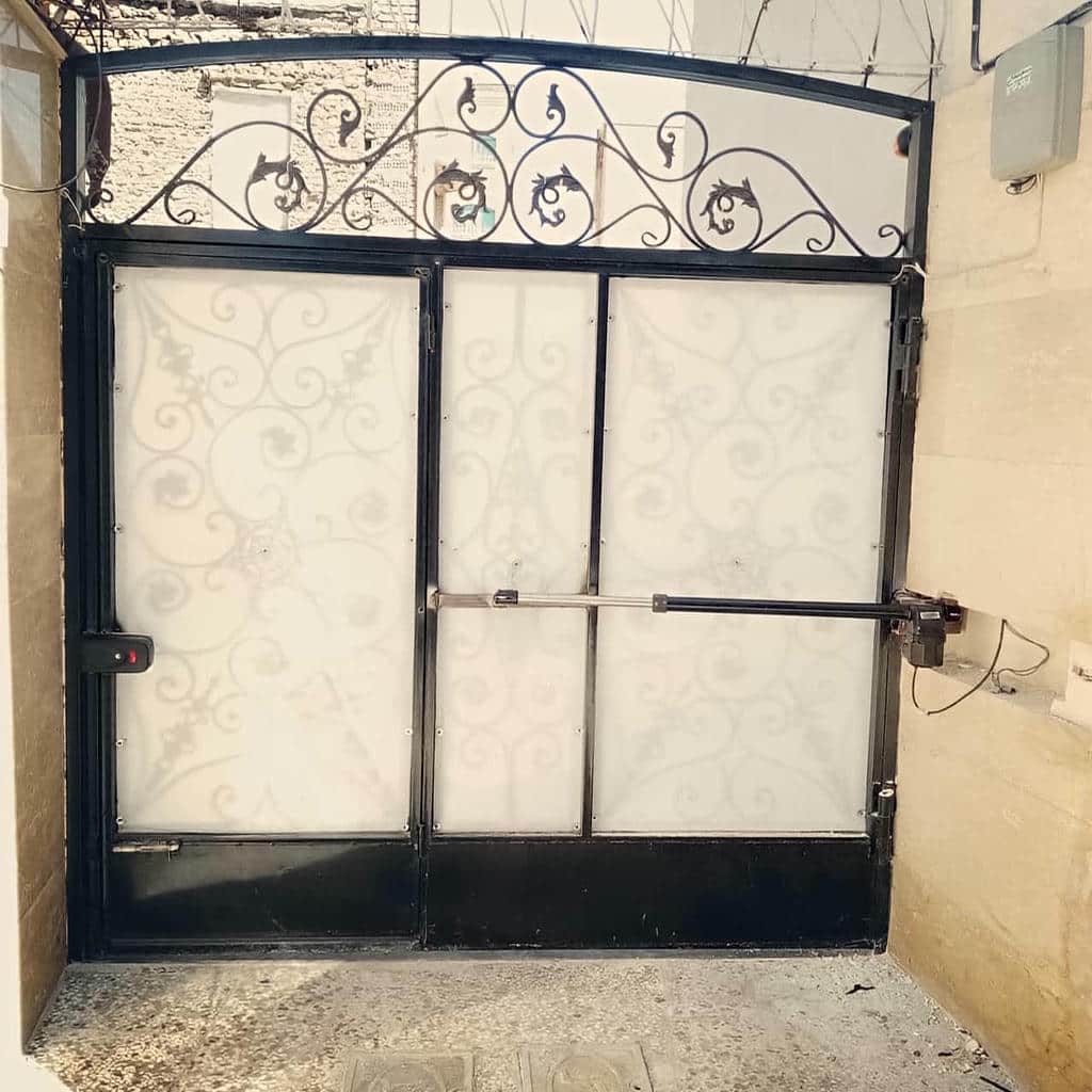نصب جک درب پارکینگ پرتردد در کمال شهر