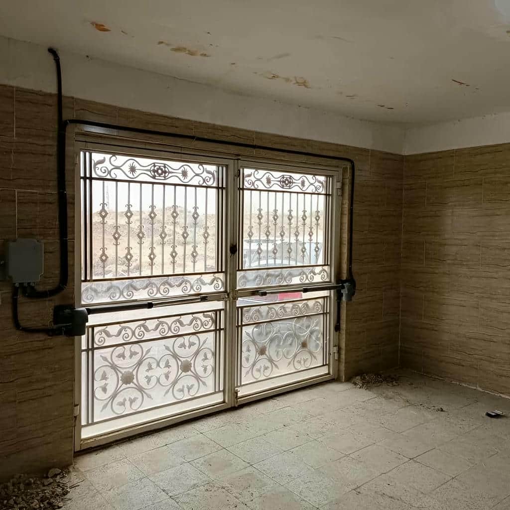 نصب جک درب برقی پارکینگ اتوماتیک در همدان