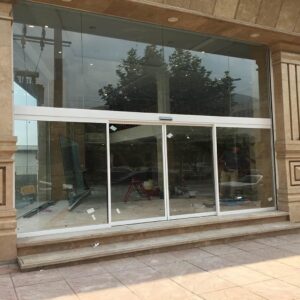 قیمت درب لولایی اتوماتیک شیشه ای