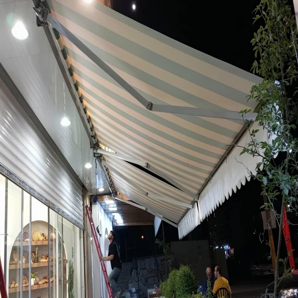 سایبان حیاط تاشو با پارچه طوسی روشن سایبان حیاط تاشو با پارچه طوسی روشن