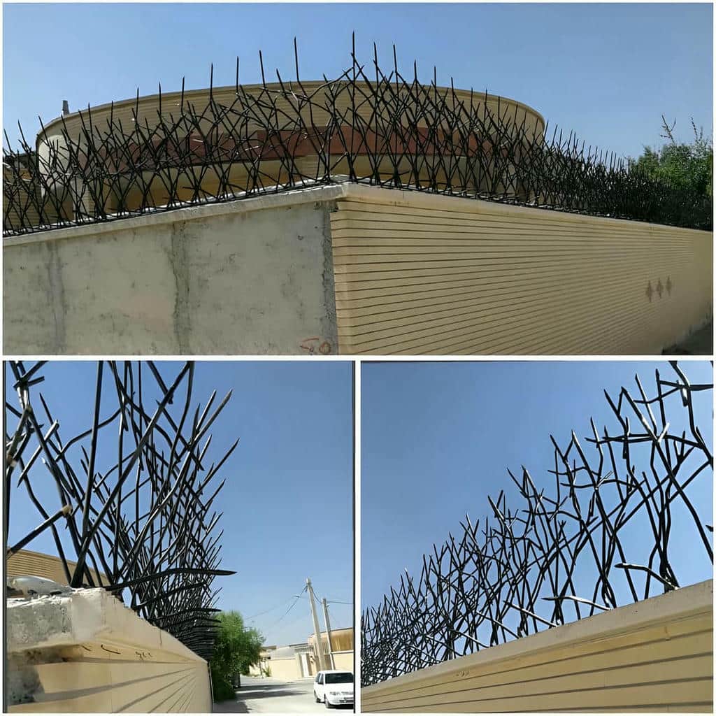 حفاظ دیوار سرنیزه‌ای فلزی کنار ورودی خانه