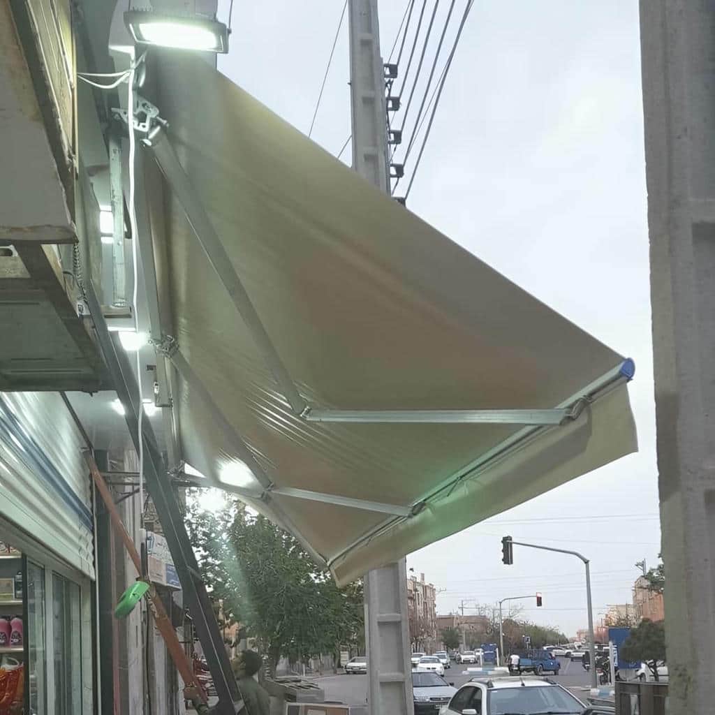 سایبان برقی در کرمانشاه برای ورودی مغازه