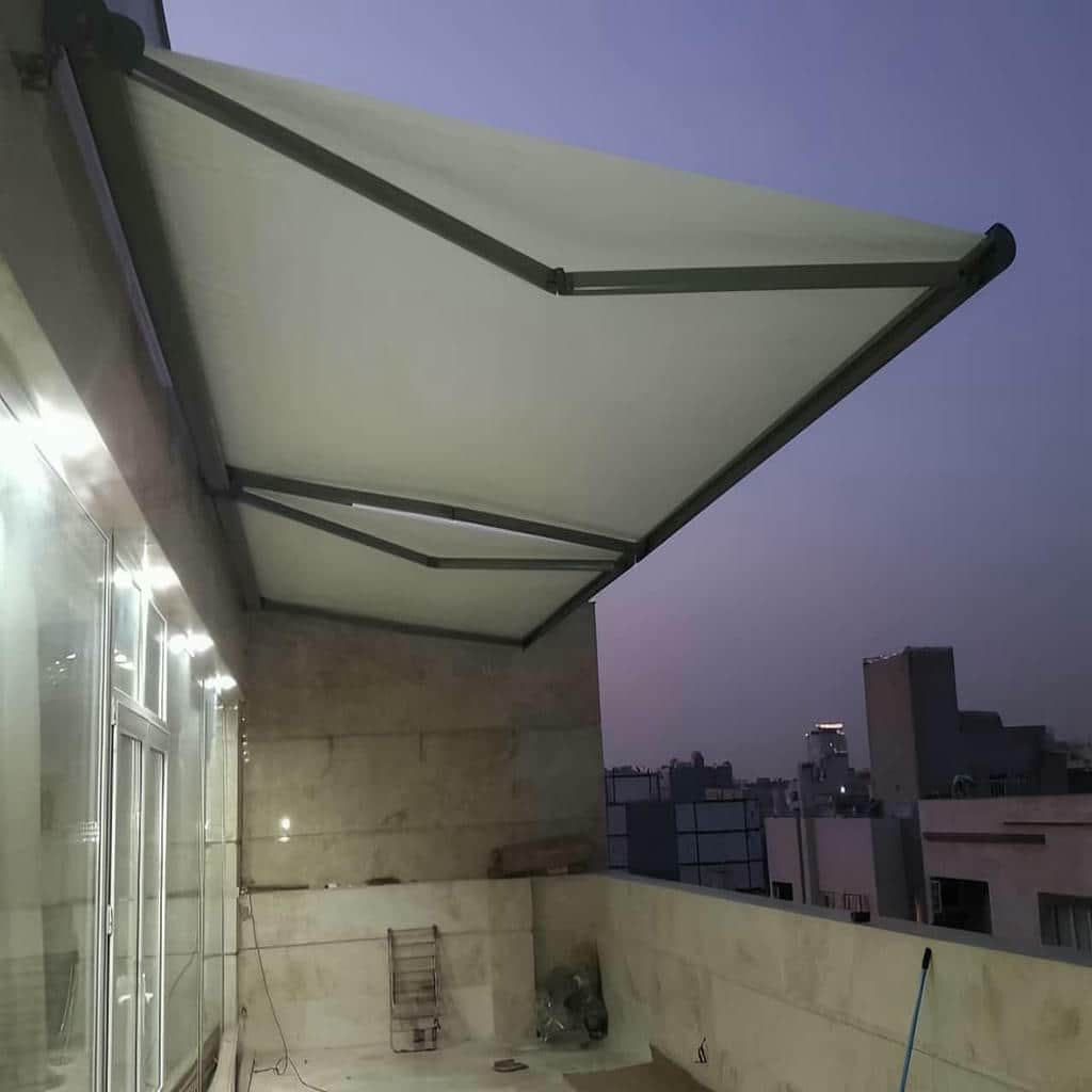 سایه بان اتوماتیک نمای مغازه با پارچه طوسی