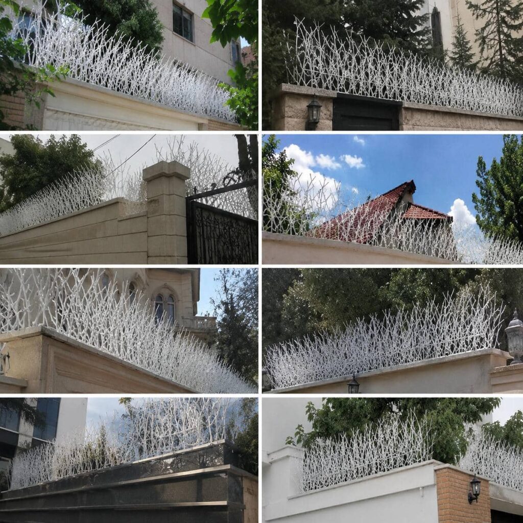 نرده فلزی مشکی روی حصار مجاور نگهبانی